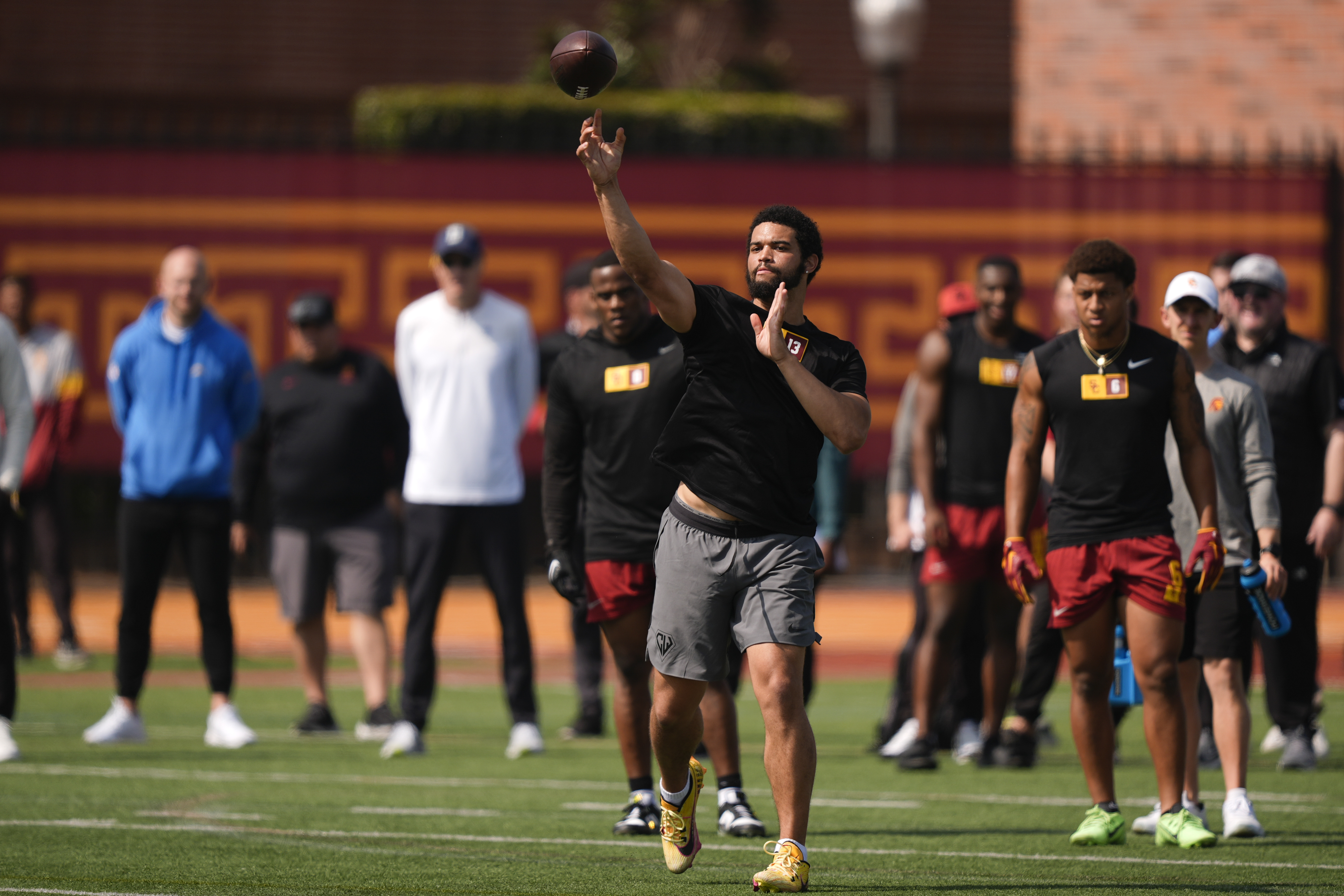 Southern California quarterback Caleb Williams warms up at the school's...