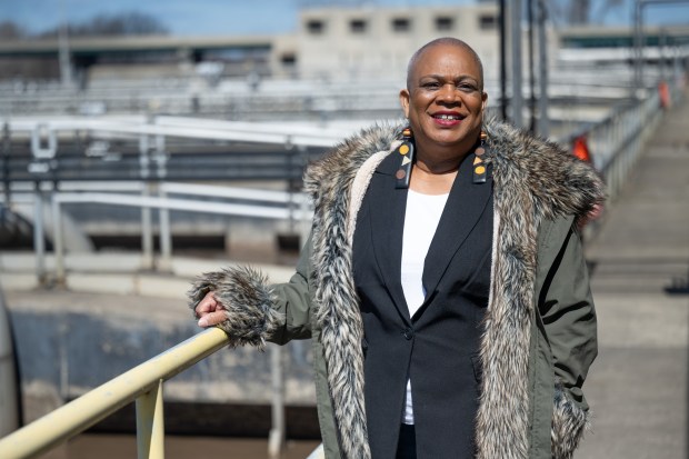 Rhonda Anderson, the new executive director of the Gary Sanitary District, poses for a photo near the facility's aeration tanks on Wednesday, March 27, 2024. (Kyle Telechan/for the Post-Tribune)