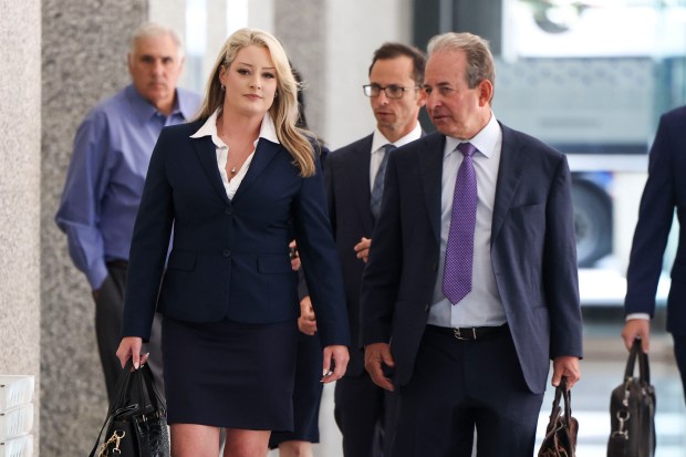 Jessica Nesbitt walks out with her attorney, Barry Sheppard, after her sentencing at Dirksen U.S. Courthouse on July 18, 2023. (Eileen T. Meslar/Chicago Tribune)
