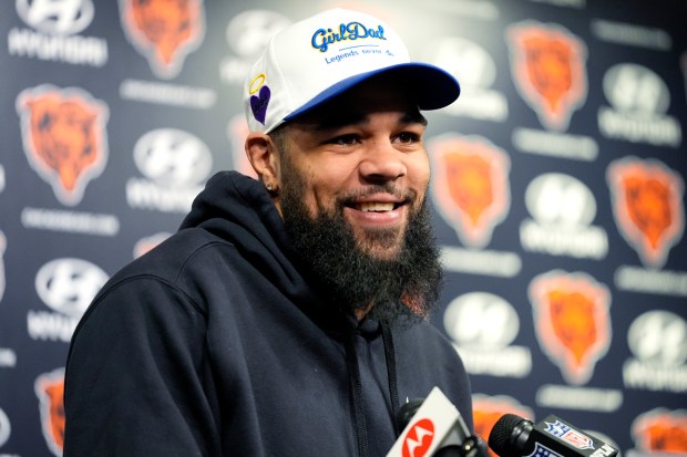 Bears wide receiver Keenan Allen smiles as he listens to reporters at a news conference at Halas Hall on Saturday, March 16, 2024, in Lake Forest. (AP Photo/Nam Y. Huh)