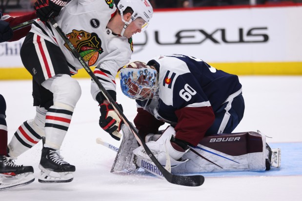 Avalanche goalie Justus Annunen stops a shot by the Blackhawks' Ryan Donato on Monday, March 4, 2024, in Denver. (Alysa Rubin/Getty Images)