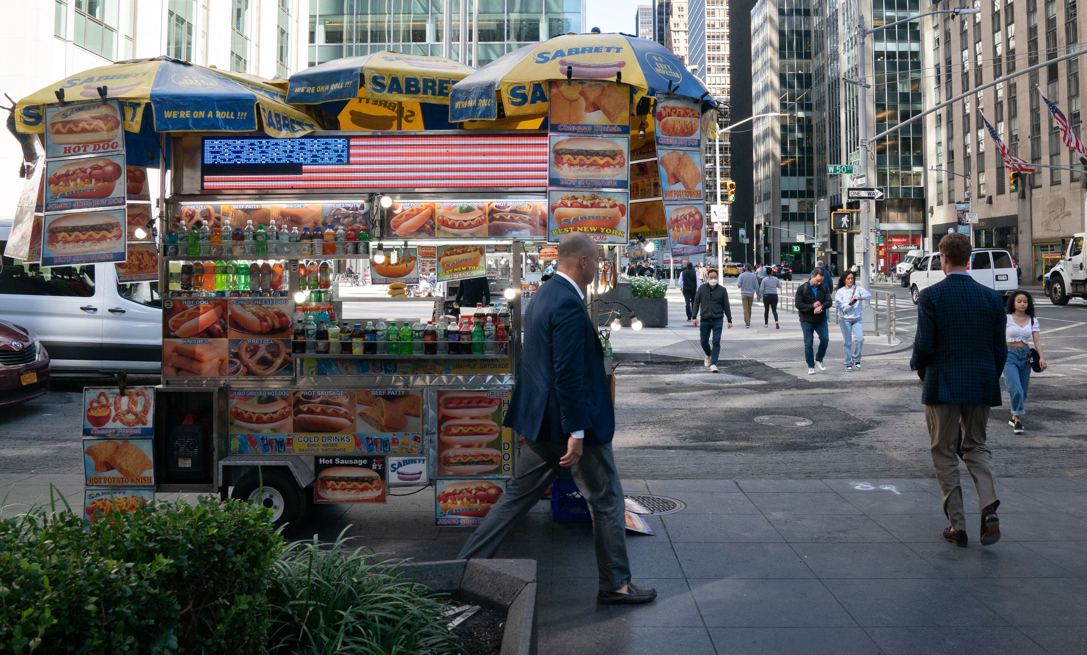 a food cart on a New York City sidewalk