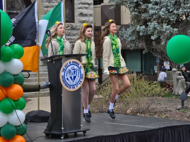 Members of the McNulty Irish Dancers perform Sunday during the events in downtown Aurora honoring St. Patrick's Day. (Gloria Casas / For The Beacon-News)