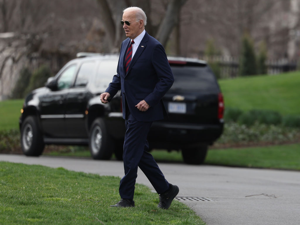 Joe Biden walking in his new Hokas