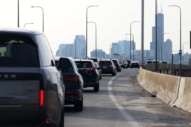Heavy traffic creeps along on the Kennedy Expressway between Fullerton and North avenues as the reversible lanes close, March 12, 2024. (Antonio Perez/Chicago Tribune)