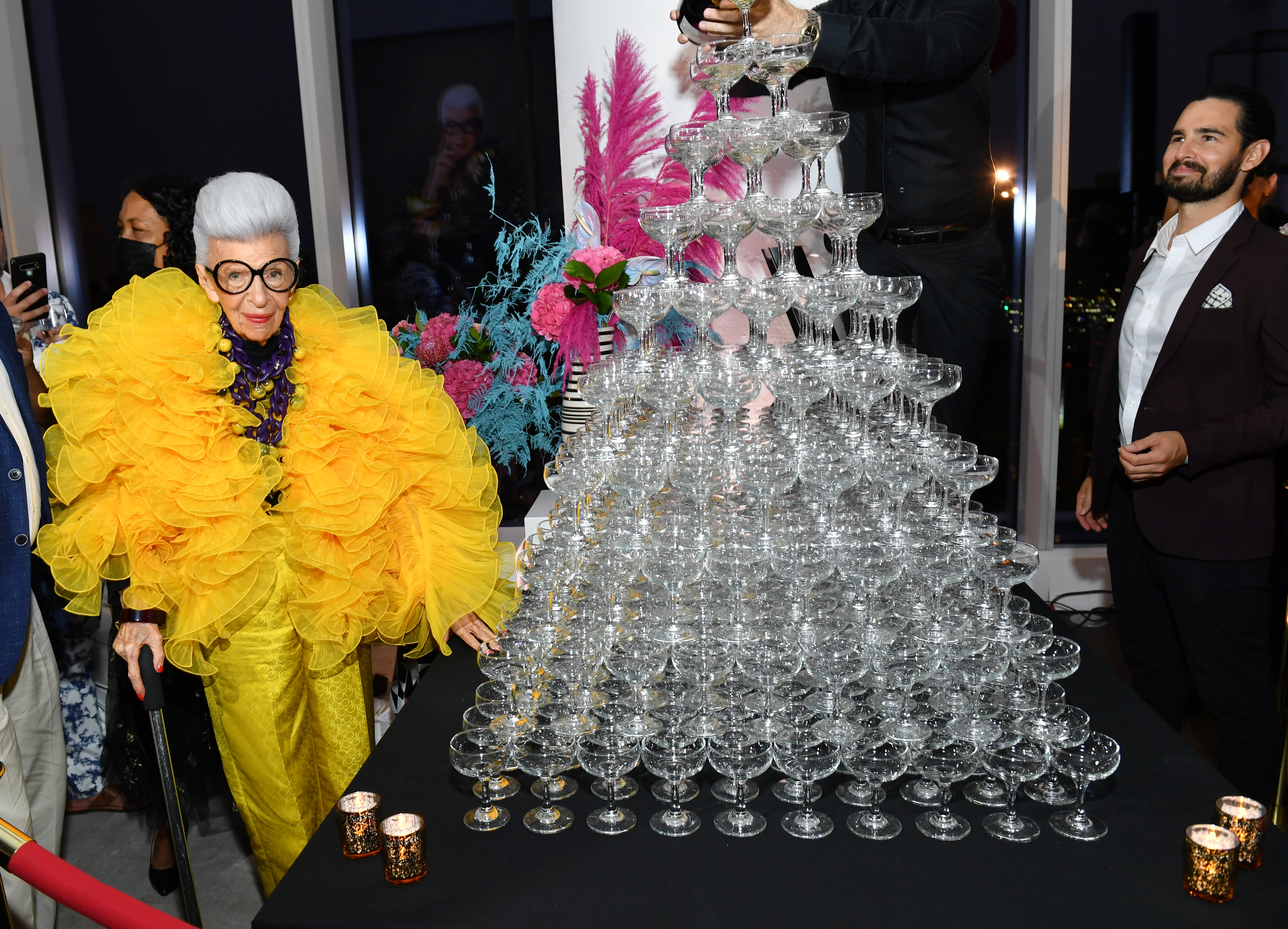 A photo of Iris Apfel at her 100th birthday party