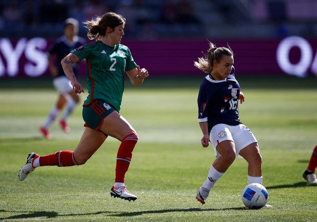 LOS ANGELES, CALIFORNIA - MARCH 03: Ramona MartÃ­nez #16 of Paraguay controls the ball against Nicolette Hernandez #2 of Mexico during the quarterfinals of 2024 Concacaf W Gold Cup at BMO Stadium on March 03, 2024 in Los Angeles, California. (Photo by Ronald Martinez/Getty Images) ** OUTS - ELSENT, FPG, CM - OUTS * NM, PH, VA if sourced by CT, LA or MoD **