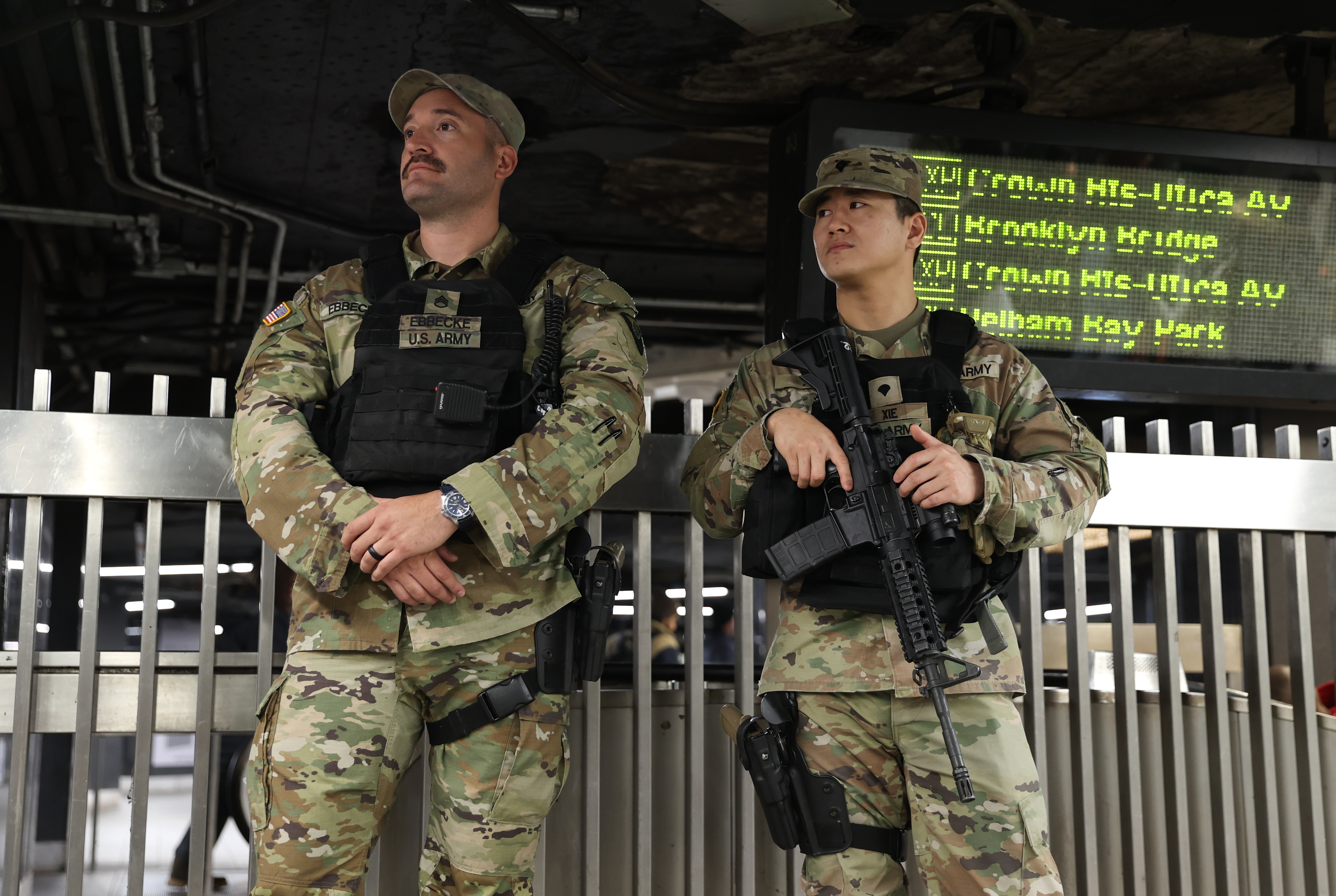 National Guard members posted in a subway station.