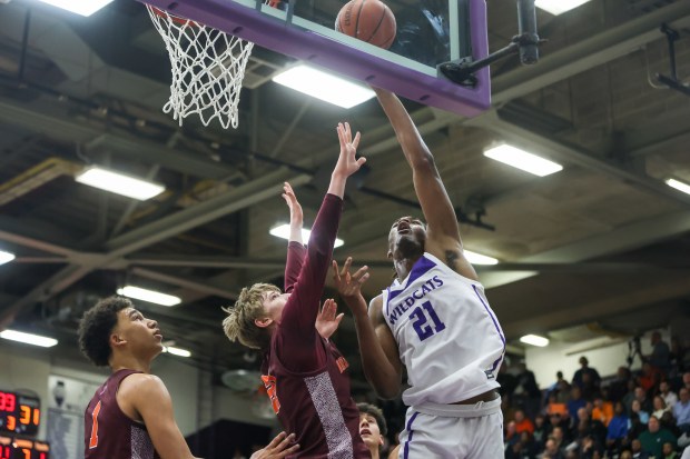Thornton's Morez Johnson Jr (21) shoots a layup during the Class 3A Thornton Sectional final against Brother Rice on Friday, March 1, 2024. (Troy Stolt/for the Aurora Beacon News)