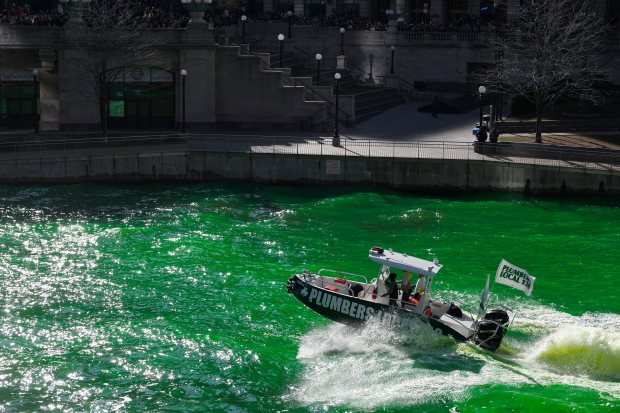 The Chicago River is dyed green by the The Chicago Plumbers Union, Chicago Journeymen Plumbers Local 130, to celebrate St. Patrick's Day on March 16, 2024 in downtown Chicago. (Vincent Alban/Chicago Tribune)