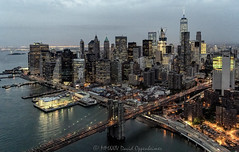 The Brooklyn Bridge, Financial District, and The Battery Skyline of Lower Manhattan Aerial View