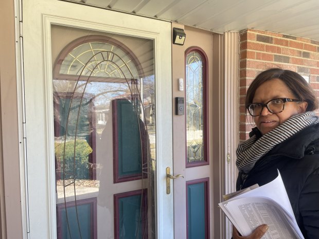 Glora K. White door knocks for votes on Thursday, Feb. 29, ahead of the primary for House District 29. (Hank Sanders/Daily Southtown)