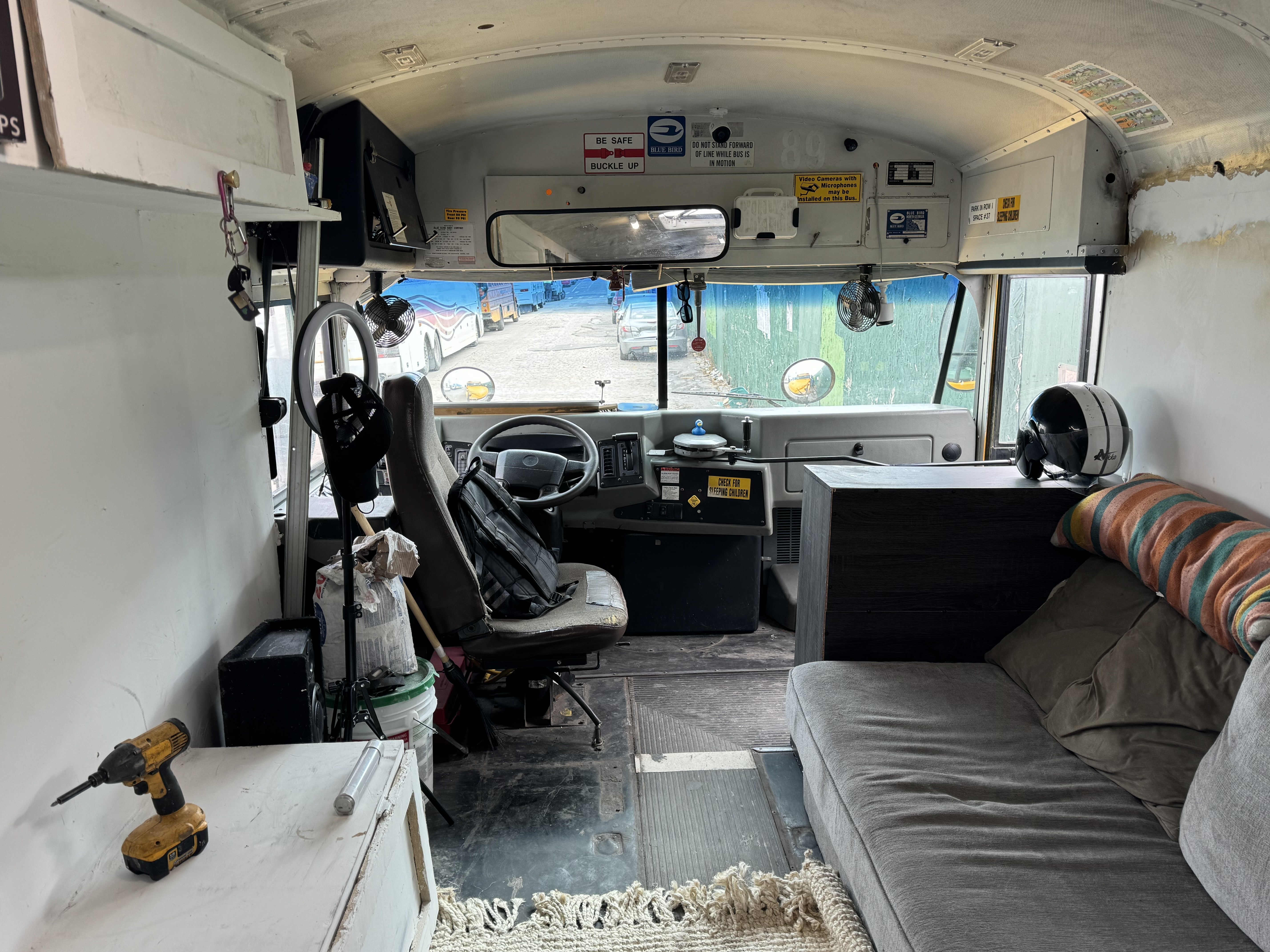 Photo of school  bus converted into shelter for migrants