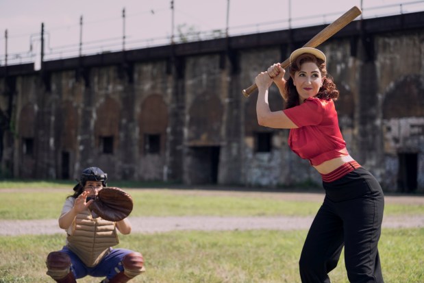 Rockford Peaches player Greta (D'Arcy Carden) stands at the plate ready to swing in a scene from "A League of Their Own." (Courtesy of Prime Video)