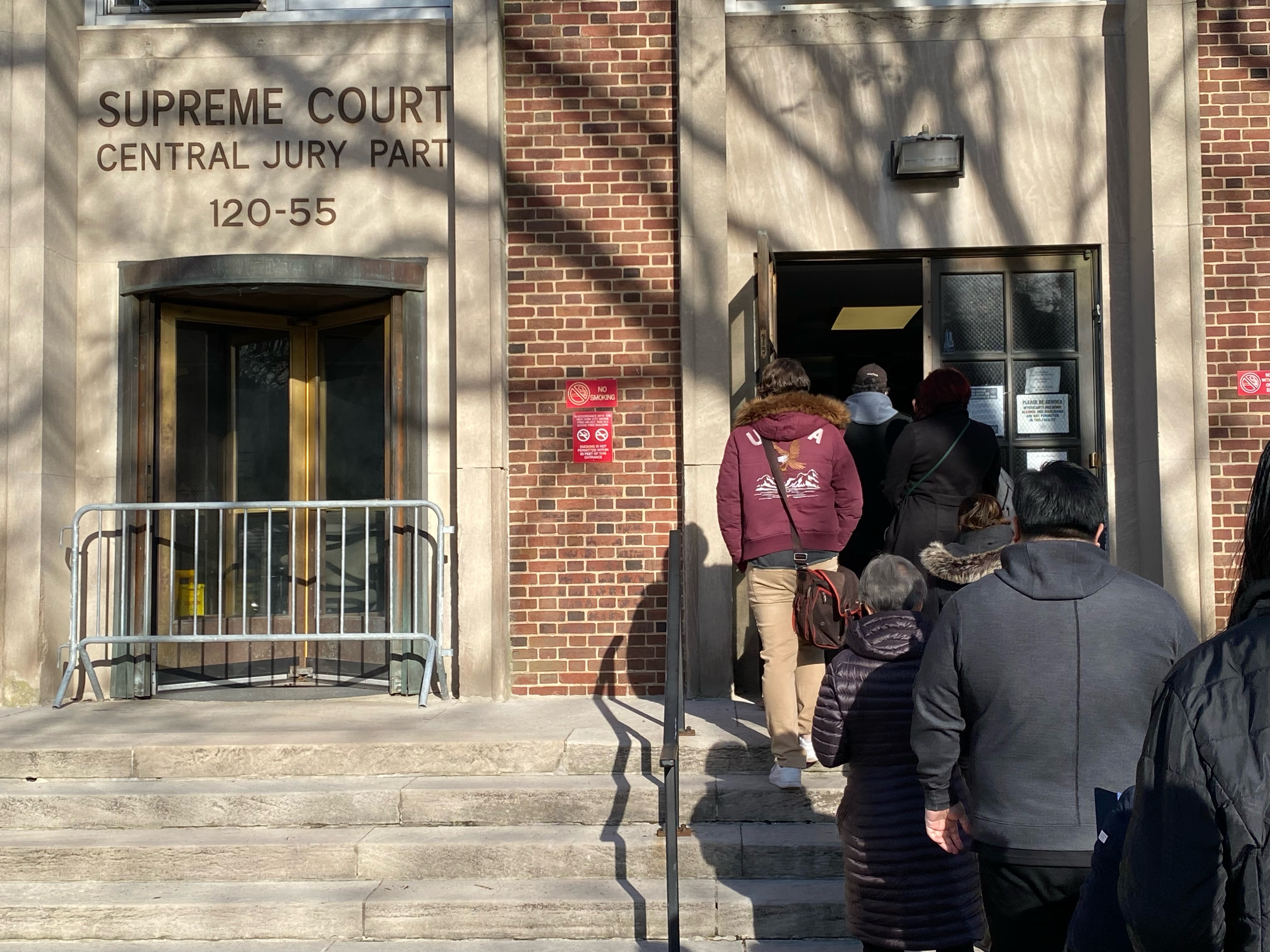 Jurors lining up to enter Supreme Court for Jury Duty, Queens, New York