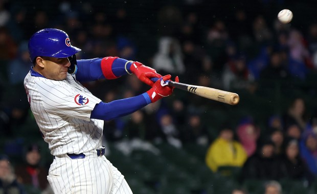 Chicago Cubs catcher Miguel Amaya (9) drives in a run with a sacrifice fly in the second inning of a game against the Colorado Rockies at Wrigley Field in Chicago on Wednesday, April 3, 2024. (Chris Sweda/Chicago Tribune)