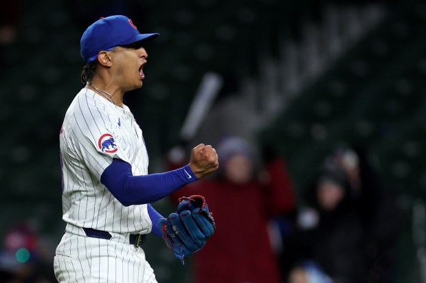 Chicago Cubs relief pitcher Adbert Alzolay (73) celebrates after closing out the Colorado Rockies in the ninth inning of a game at Wrigley Field in Chicago on Wednesday, April 3, 2024. (Chris Sweda/Chicago Tribune)