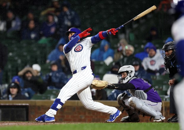 Chicago Cubs catcher Miguel Amaya (9) singles in two runs with a third scoring on a throwing error in the sixth inning of a game against the Colorado Rockies at Wrigley Field in Chicago on Wednesday, April 3, 2024. (Chris Sweda/Chicago Tribune)