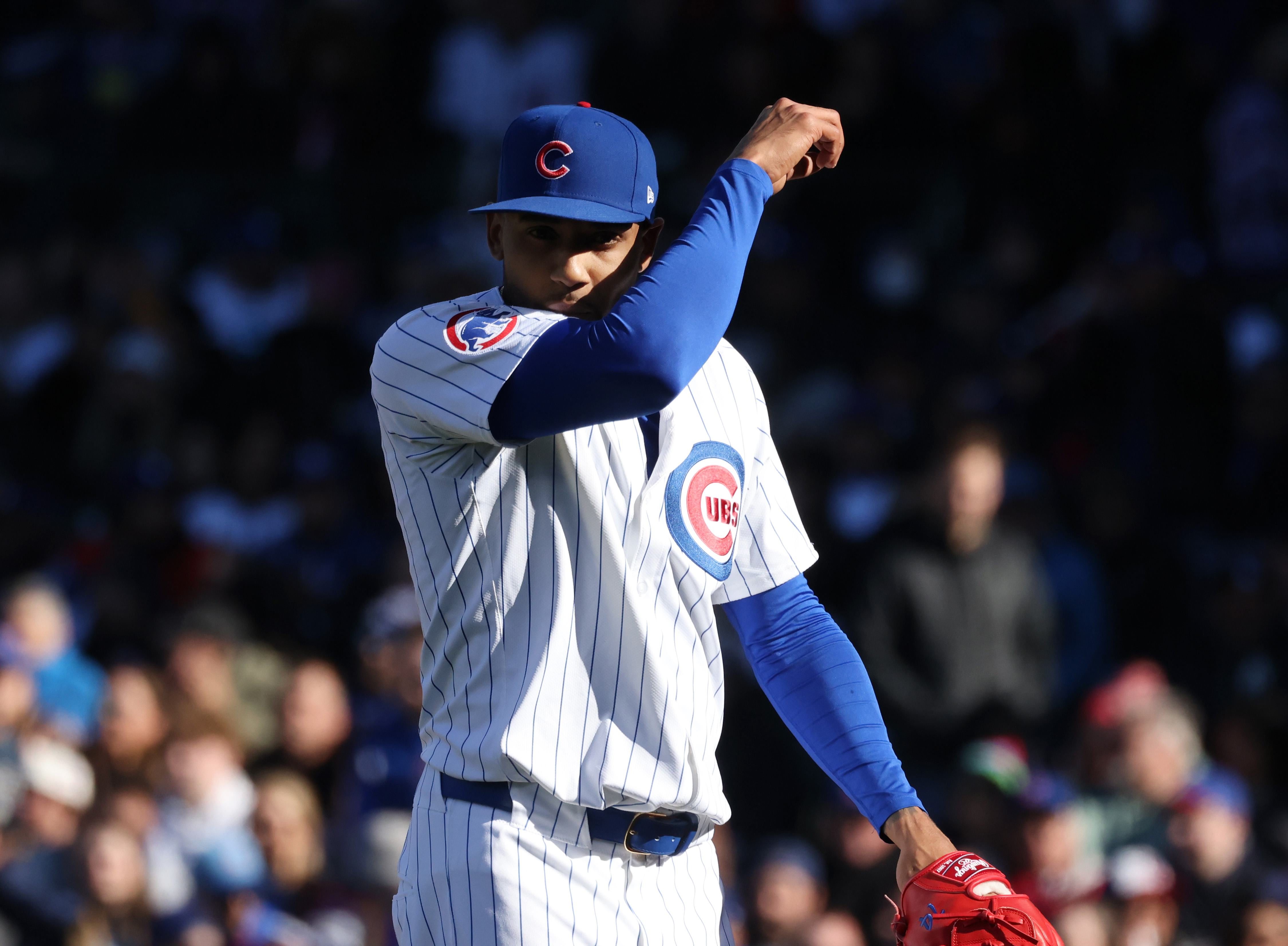 Cubs relief pitcher Jose Cuas heads to the dugout after throwing in the fifth inning against the Dodgers at Wrigley Field on April 6, 2024, in Chicago. Cuas gave up three runs in the inning. (John J. Kim/Chicago Tribune)