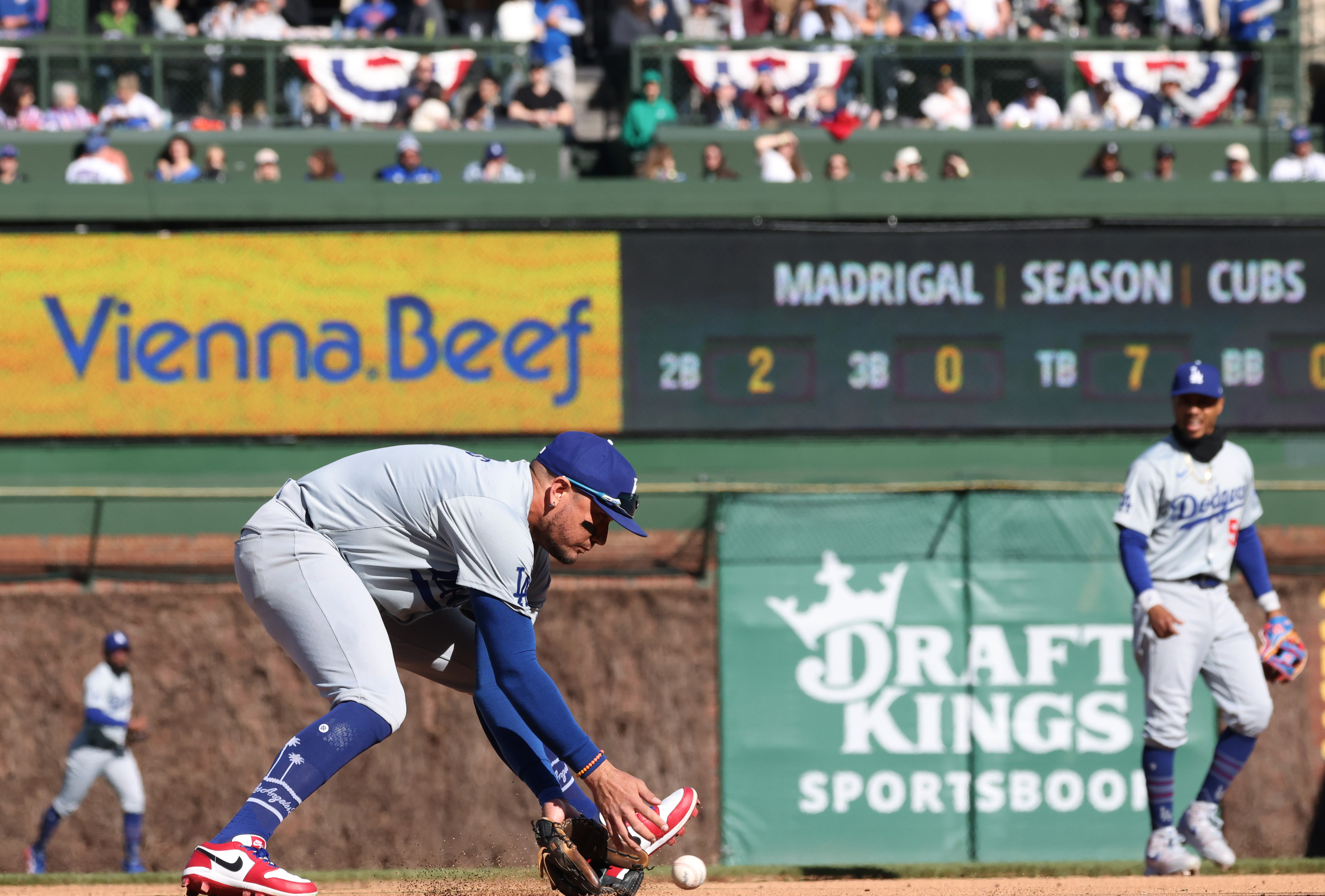 Dodgers third baseman Max Muncy (13) fields a grounder in the fourth inning against the Cubs at Wrigley Field on April 6, 2024, in Chicago. (John J. Kim/Chicago Tribune)