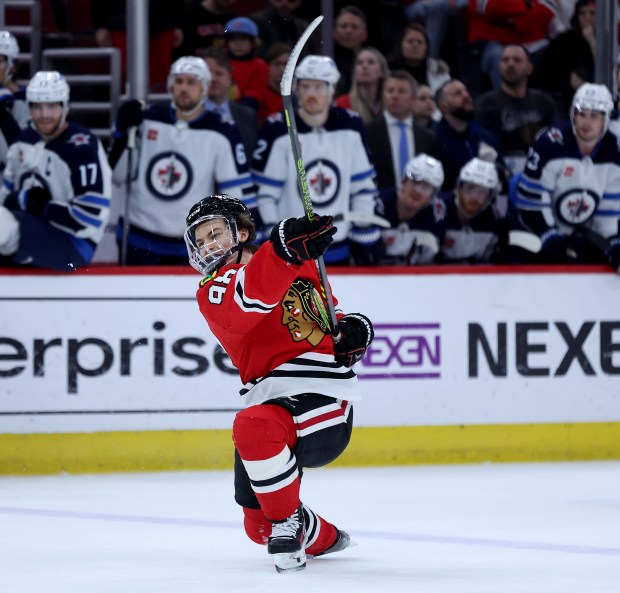 Blackhawks center Connor Bedard follows through on a shot against the Jets on Feb. 23, 2024, at the United Center. (Chris Sweda/Chicago Tribune)