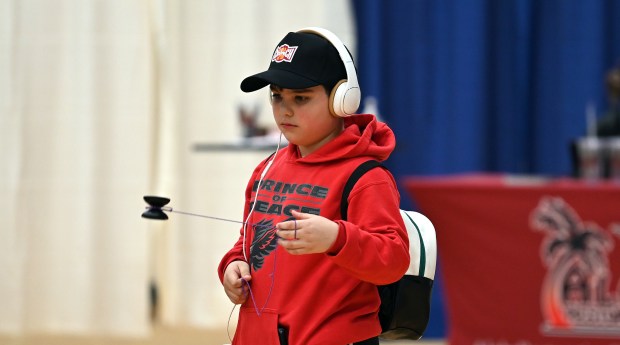 Isaias Gonzalez, 7, a second-grader from Lake Villa, plays with a yoyo at the Spring Fest Expo at Lakes Community High School in Lake Villa on April 6, 2024. (Karie Angell Luc/Lake County News-Sun)