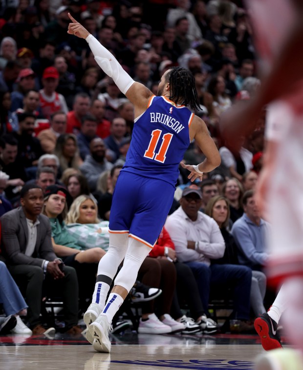 New York Knicks guard Jalen Brunson (11) celebrates after hitting a big shot in the second half of a game against the Chicago Bulls at the United Center in Chicago on April 9, 2024. (Chris Sweda/Chicago Tribune)