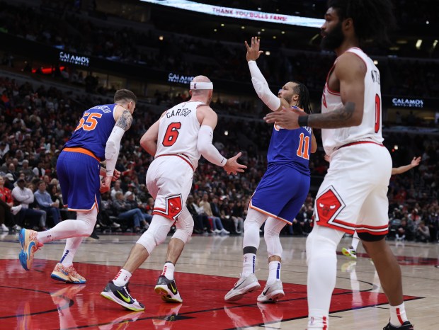 New York Knicks guard Jalen Brunson (11) celebrates after hitting a shot against Chicago Bulls guard Alex Caruso (6) in the second half of a game at the United Center in Chicago on April 9, 2024. (Chris Sweda/Chicago Tribune)