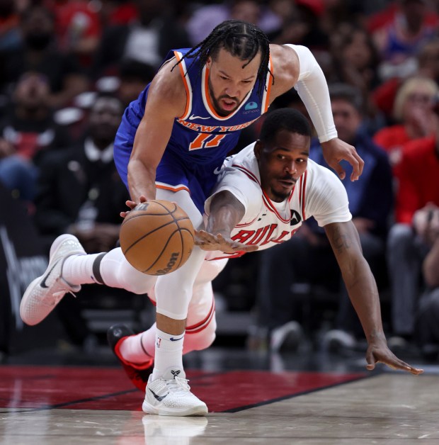 New York Knicks guard Jalen Brunson sprints down the court as Chicago Bulls guard Javonte Green tries to make a steal in the second half of a game at the United Center in Chicago on April 9, 2024. (Chris Sweda/Chicago Tribune)