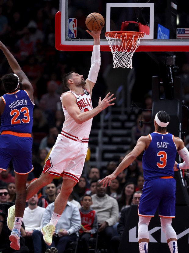 Chicago Bulls center Nikola Vucevic (9) scores in the second half of a game against the New York Knicks at the United Center in Chicago on April 9, 2024. (Chris Sweda/Chicago Tribune)
