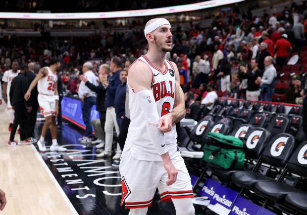 Chicago Bulls guard Alex Caruso (6) walks off the court after a loss to the New York Knicks at the United Center in Chicago on April 9, 2024. (Chris Sweda/Chicago Tribune)