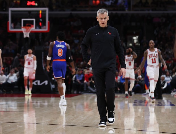 Chicago Bulls head coach Billy Donovan walks on the court going into a timeout in the first half of a game against the New York Knicks at the United Center in Chicago on April 9, 2024. (Chris Sweda/Chicago Tribune)