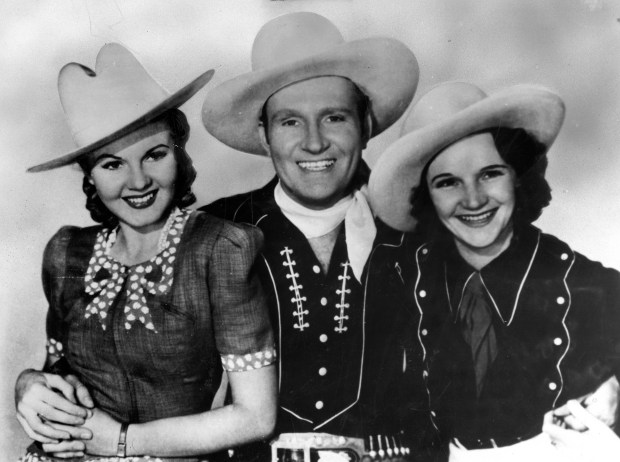 Back in the '30s and '40s, Chicago was the country music capital of the world. That's when the WLS National Barn Dance aired, with June Storey, from left, Gene Autry and Patsy Montana, circa 1940s. (Chicago Tribune archive)