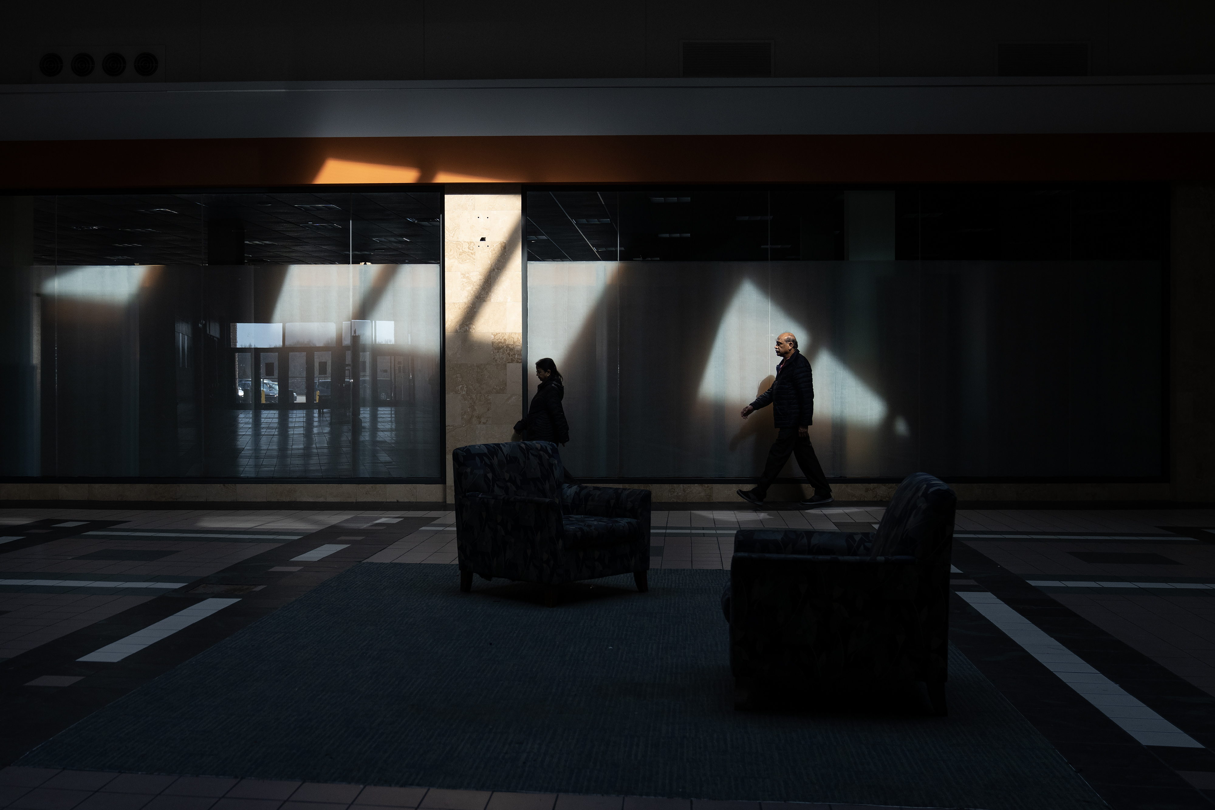 Mall walkers take a last stroll through Spring Hill Mall in West Dundee on March 20, 2024. (E. Jason Wambsgans/Chicago Tribune)