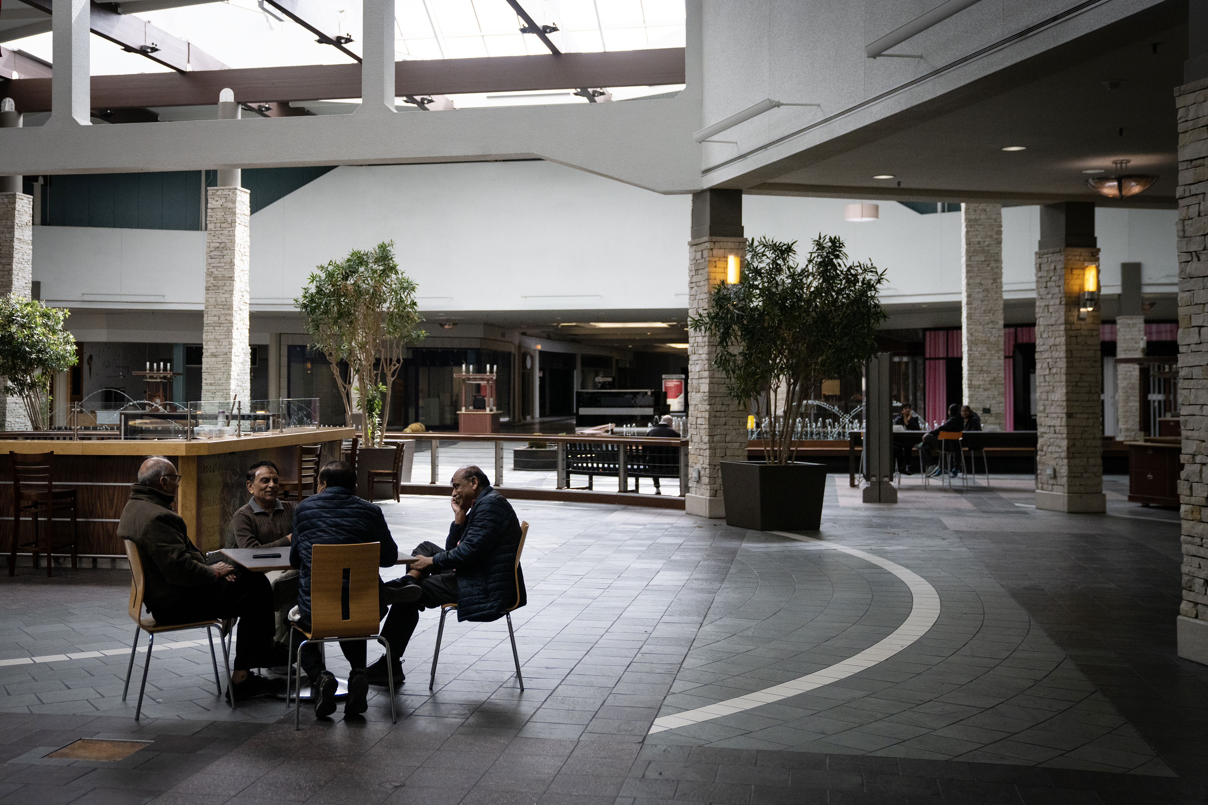 A group of friends gather to walk and chat at the Spring Hill Mall in West Dundee for the last time. The friends have been meeting at the mall for about 15 years. (E. Jason Wambsgans/Chicago Tribune)