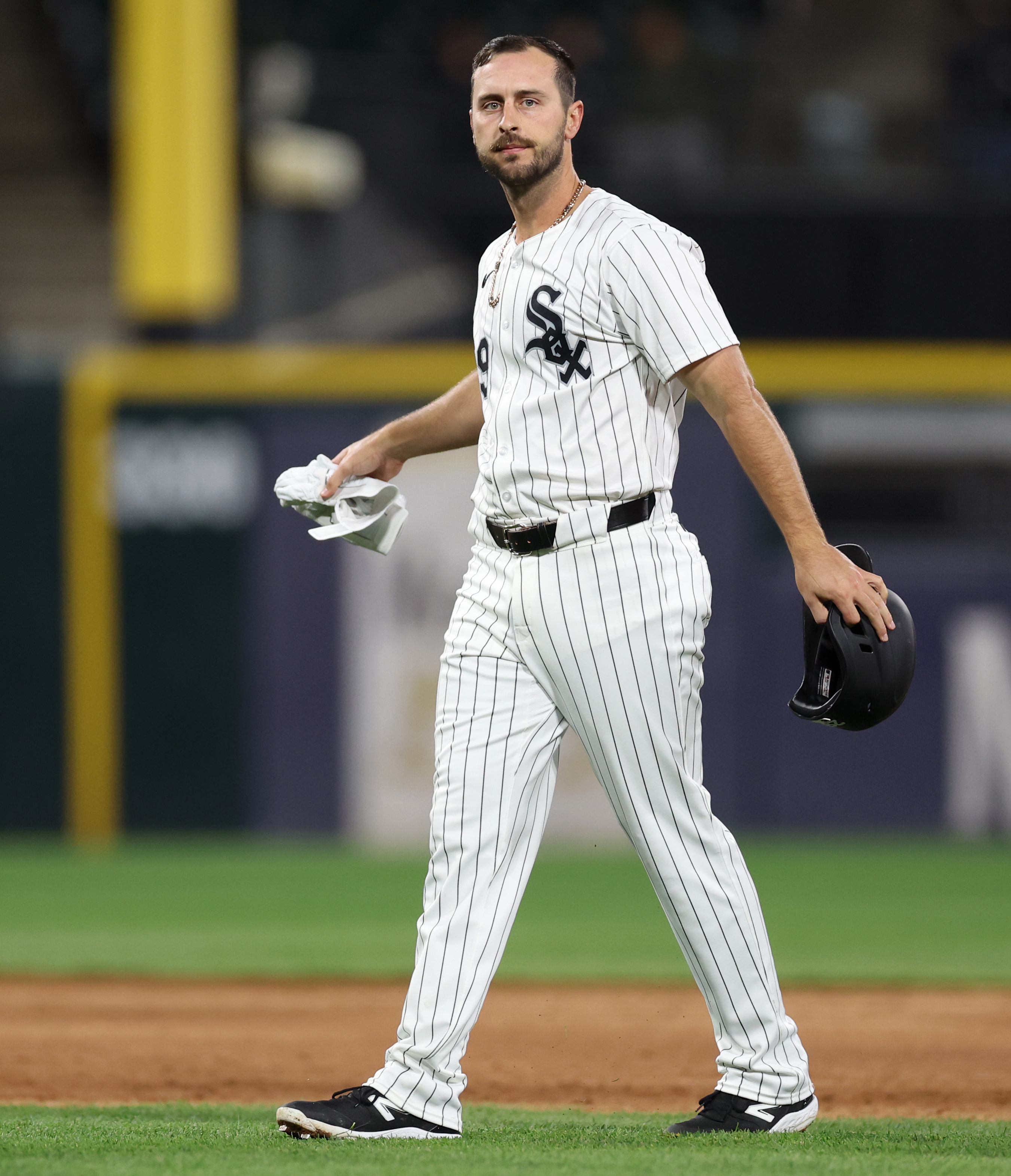 White Sox shortstop Paul DeJong walks on the infield after flying out to end the fourth inning against the Reds on April 12, 2024, at Guaranteed Rate Field. (Chris Sweda/Chicago Tribune)