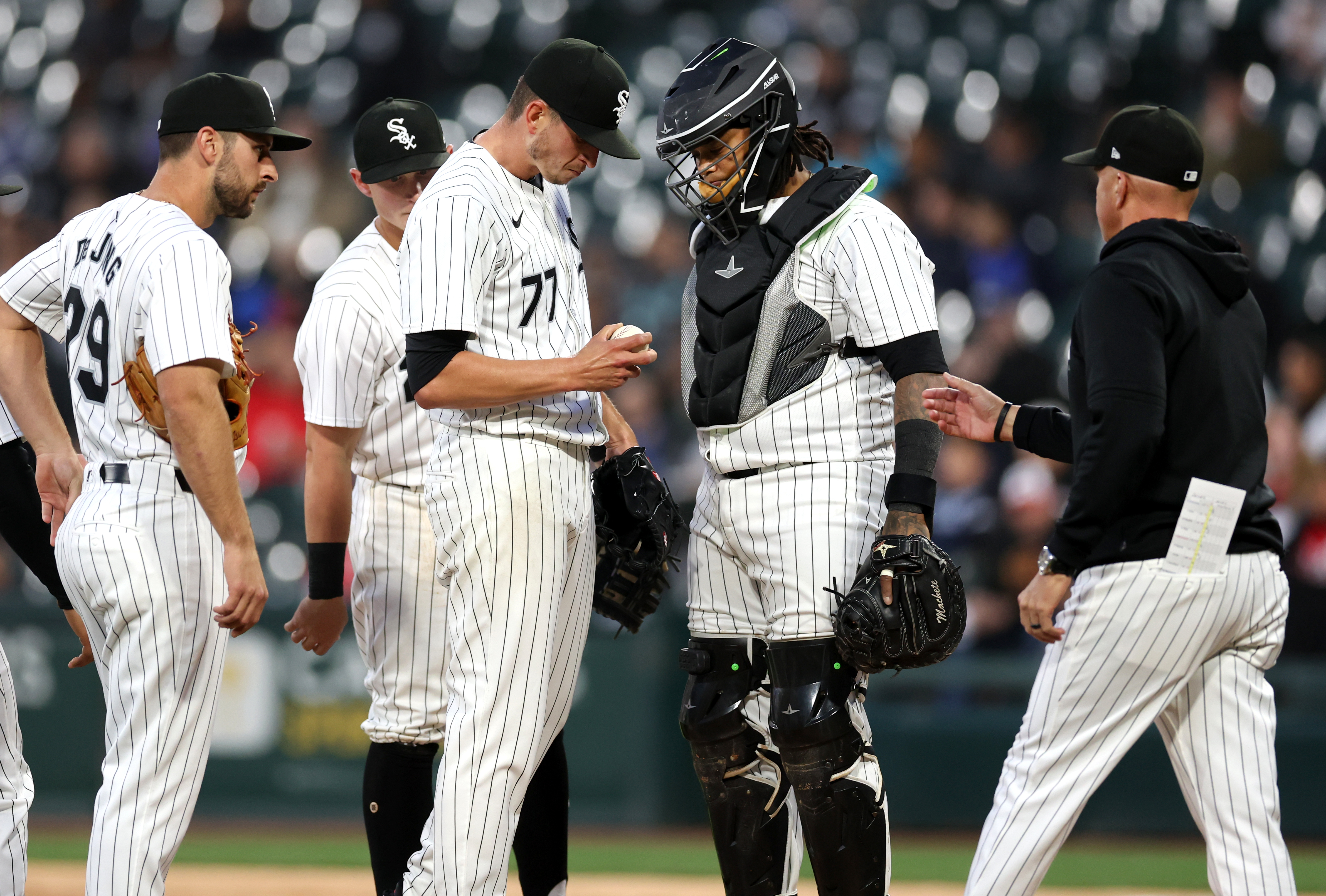 White Sox starting pitcher Chris Flexen (77) is pulled from a game against the Reds in the third inning on April 12, 2024, at Guaranteed Rate Field. (Chris Sweda/Chicago Tribune)