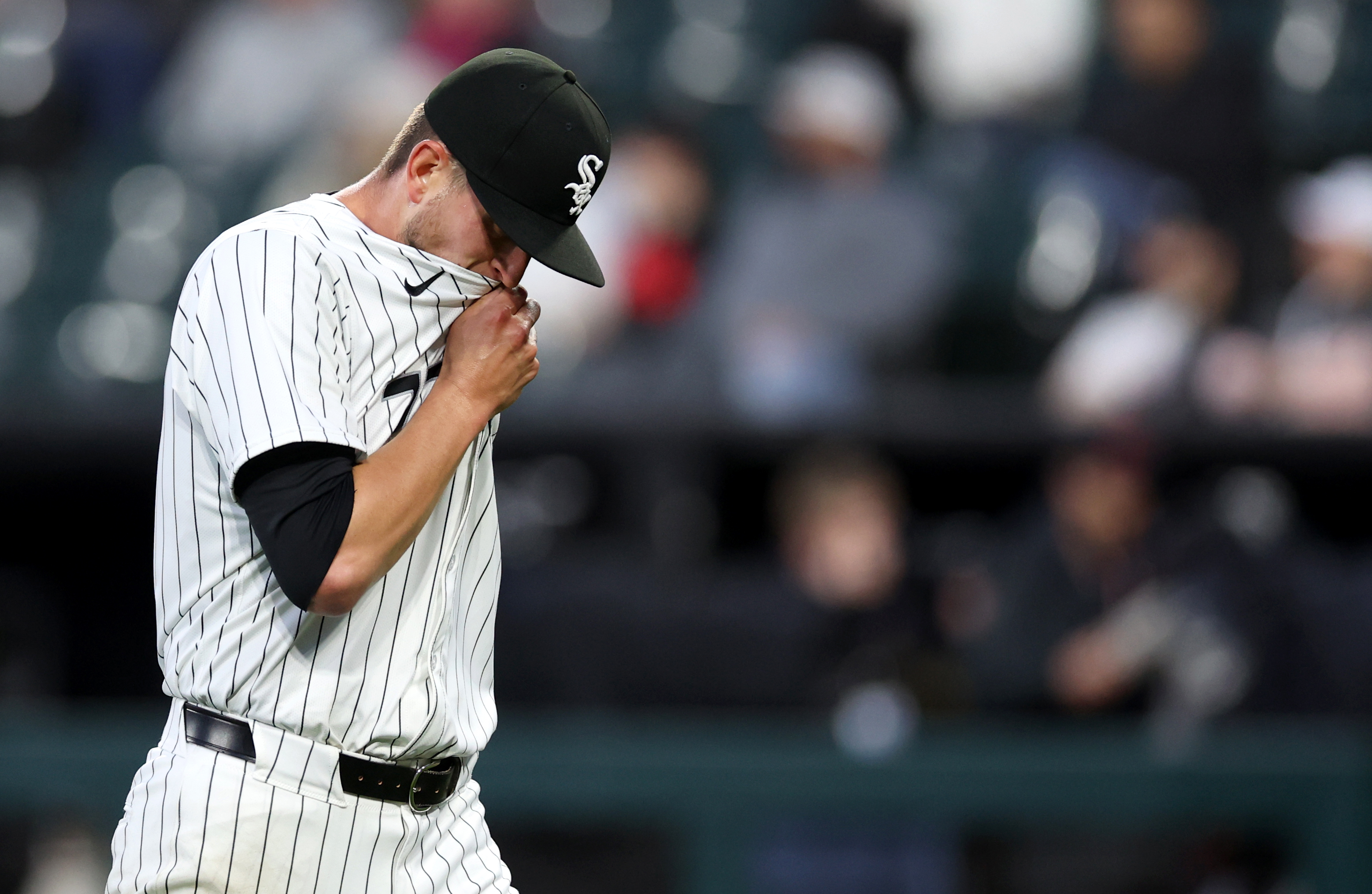 White Sox starting pitcher Chris Flexen heads to the locker room after being pulled against the Cincinnati Reds in the third inning on April 12, 2024, at Guaranteed Rate Field. (Chris Sweda/Chicago Tribune)