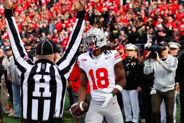 Ohio State wide receiver Marvin Harrison Jr. reacts after scoring a touchdown against Rutgers on Nov. 4, 2023. (Noah K. Murray/AP)
