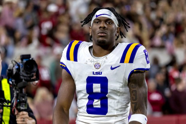 LSU wide receiver Malik Nabers jogs off the field after a touchdown against Alabama on Nov. 4, 2023, in Tuscaloosa, Ala. (AP Photo/Vasha Hunt)