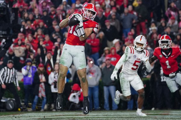 Georgia tight end Brock Bowers makes a catch for a touchdown during the second half against Mississippi on Nov. 11, 2023, in Athens, Ga. (AP Photo/John Bazemore)