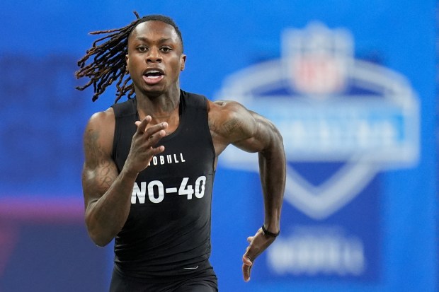 Texas wide receiver Xavier Worthy runs a drill at the NFL combine on March 2, 2024, in Indianapolis. (AP Photo/Michael Conroy)