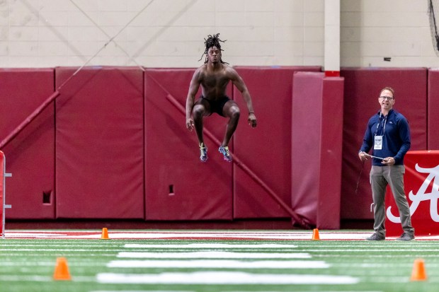 Defensive back Kool-Aid McKinstry warms up before running the 40-yard dash at Alabama pro day on March 20, 2024, in Tuscaloosa, Ala. (AP Photo/Vasha Hunt)