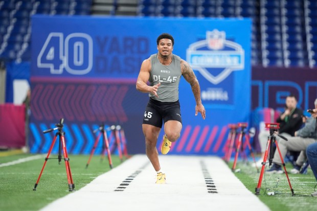 Penn State defensive lineman Chop Robinson runs the 40-yard dash at the NFL combine on Feb. 29, 2024, in Indianapolis. (AP Photo/Michael Conroy)