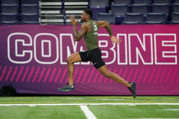Clemson defensive back Nate Wiggins runs the 40-yard dash at the NFL combine on March 1, 2024, in Indianapolis. (AP Photo/Darron Cummings)