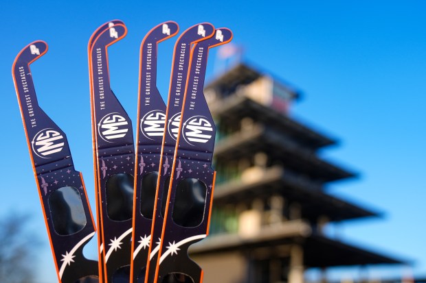 Eclipse glasses are shown at the Indianapolis Motor Speedway in Indianapolis, Monday, April 8, 2024. (AP Photo/Michael Conroy)