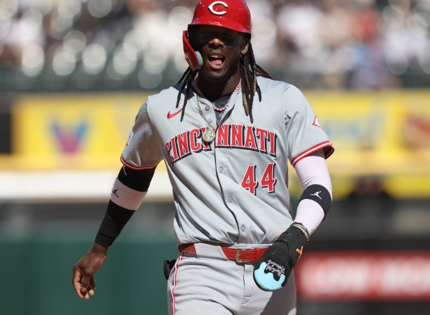 Reds shortstop Elly De La Cruz (44) heads to the dugout after getting picked off during a steal attempt in the ninth inning against the White Sox at Guaranteed Rate Field on April 13, 2024, in Chicago. (John J. Kim/Chicago Tribune)