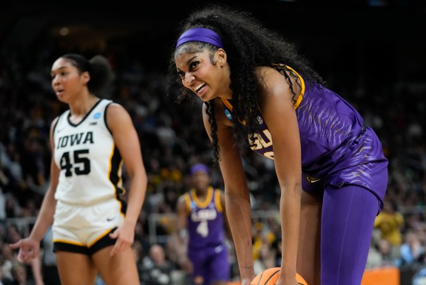 LSU forward Angel Reese reacts during an NCAA Tournament Elite Eight game against Iowa on April 1, 2024, in Albany, N.Y. (AP Photo/Mary Altaffer)