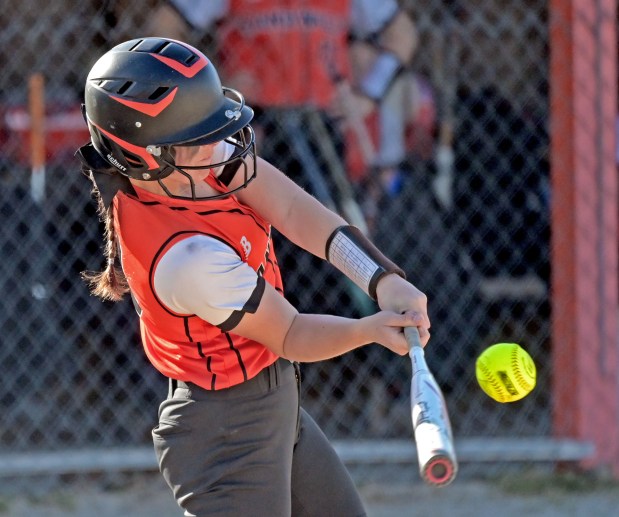 Sandwich's Brooklyn Marks gets a hit. Sandwich defeated Serena in softball, 8-1, Friday, April 12, 2024, in Sandwich, Illinois. (Jon Langham/for the Beacon-News)