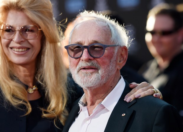Norman Jewison, center, director of the 1967 film "In the Heat of the Night," appears with his wife Lynne St. David before a 50th anniversary screening of the film at the 2017 TCM Classic Film Festival in Los Angeles on April 6, 2017. Jewison, a three-time Oscar nominee who in 1999 received an Academy Award for lifetime achievement, died "peacefully" Saturday, Jan. 20, 2024, according to publicist Jeff Sanderson. He was 97.